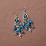 Bohemian retro ethnic style European and American ancient silver earrings goddess jewelry show face thin earrings tassel long earrings