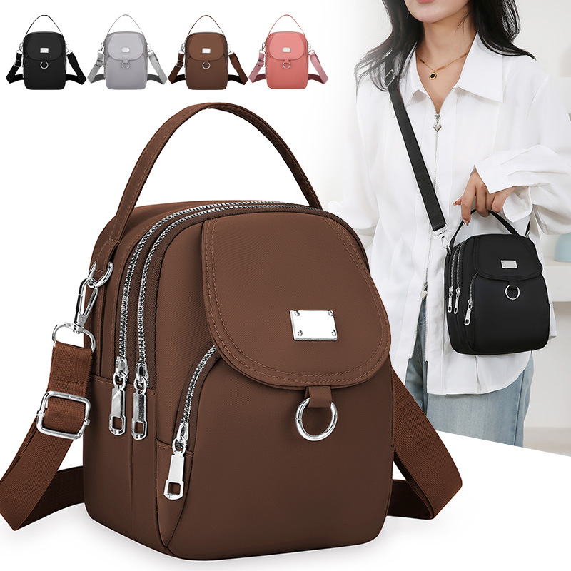 O1CN010aRVPJ2431iAiYJIN_2215812177334-0-cib.jpg Women's Casual Fashion Oxford Cloth Handbag & Crossbody High-End One-Shoulder Mobile Phone Bag - Image 1