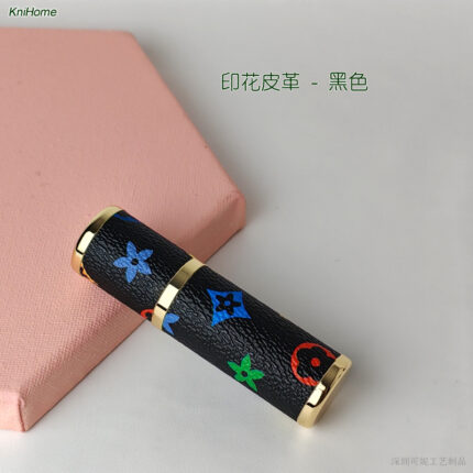 5ML gold shell; Printed leather - black; Zinc alloy veneer + inner glass bottle
