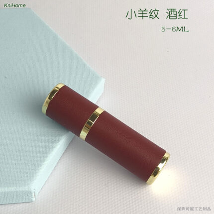 5ML gold shell; Lamb Pattern: Wine Red; Zinc alloy veneer + inner glass bottle