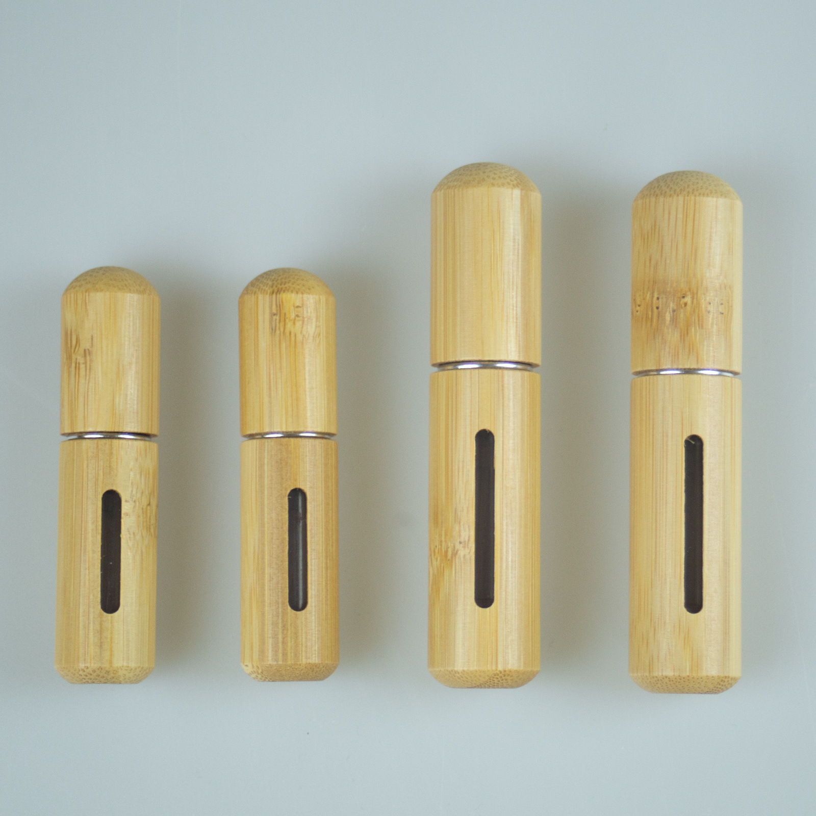 O1CN01Q8OiwZ1kSrmoJnKnn_2208150934683-0-cib-1.jpg Refillable Natural Bamboo Perfume Atomizer Bottle 5ml & 8ml Portable Travel Fine Mist Spray - Image 1