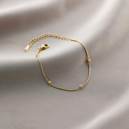 Beanie snake bone chain gold