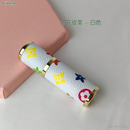 5ML gold shell; Printed leather - white; Zinc alloy veneer + inner glass bottle