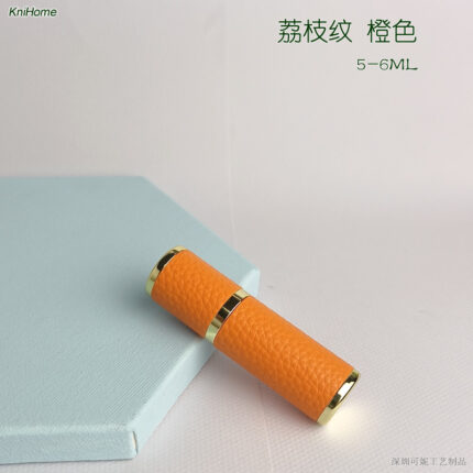5ML gold shell; Lychee pattern: orange; Zinc alloy veneer + inner glass bottle