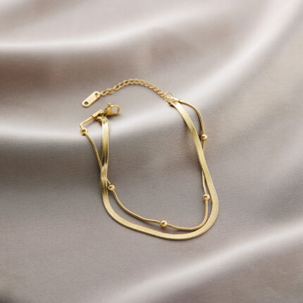 Blade + Beanie snake bone chain gold