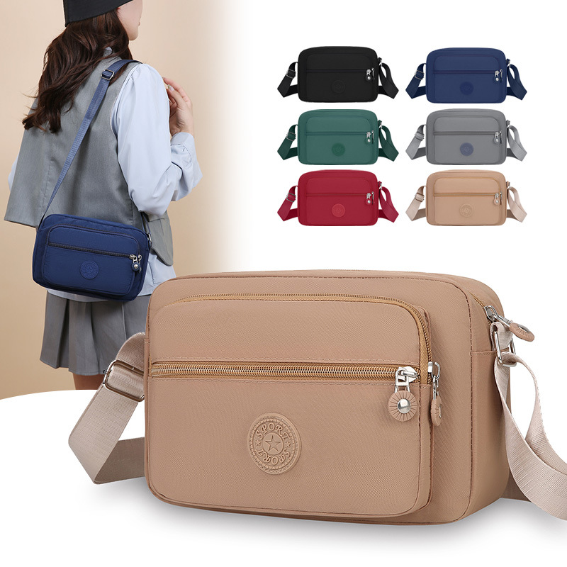 O1CN01u77W562Jttmz2yErm_2215975759480-0-cib.jpg Factory-Direct Women's Nylon Small Square Crossbody Bag Lightweight Canvas Shoulder Bag, Phone & Coin Purse - Image 1