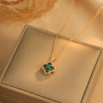Rotating emerald four-leaf flower necklace women's light luxury niche design sense advanced 2025 new temperament collarbone necklace
